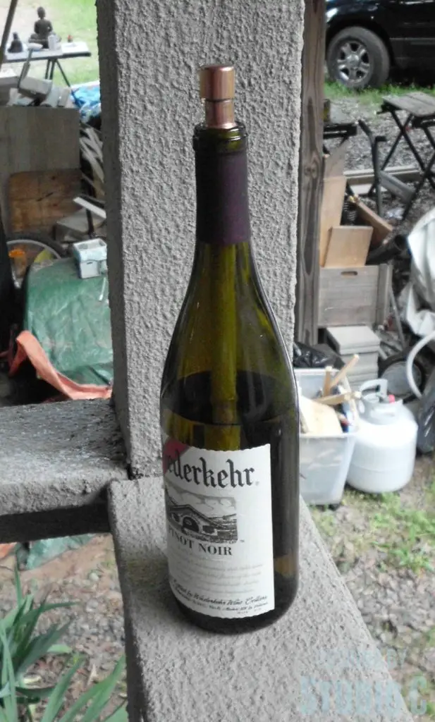 make a wine bottle torch torch filled with fuel