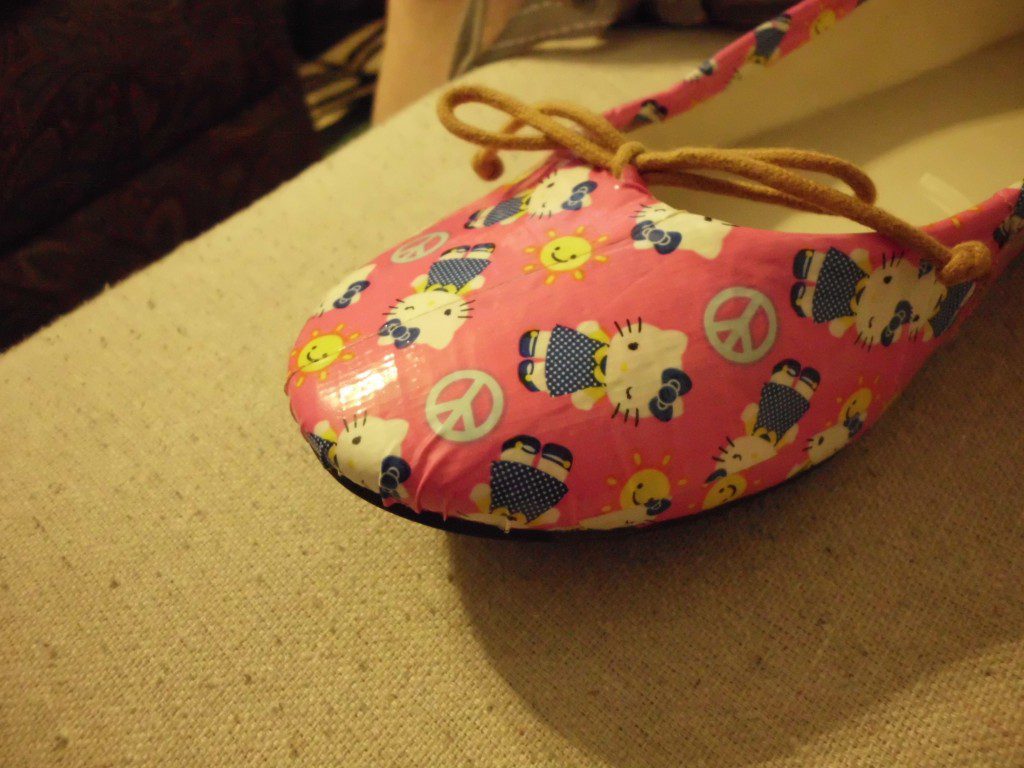 How to Give Shoes a Makeover with Duct Tape smoothing tape over toe