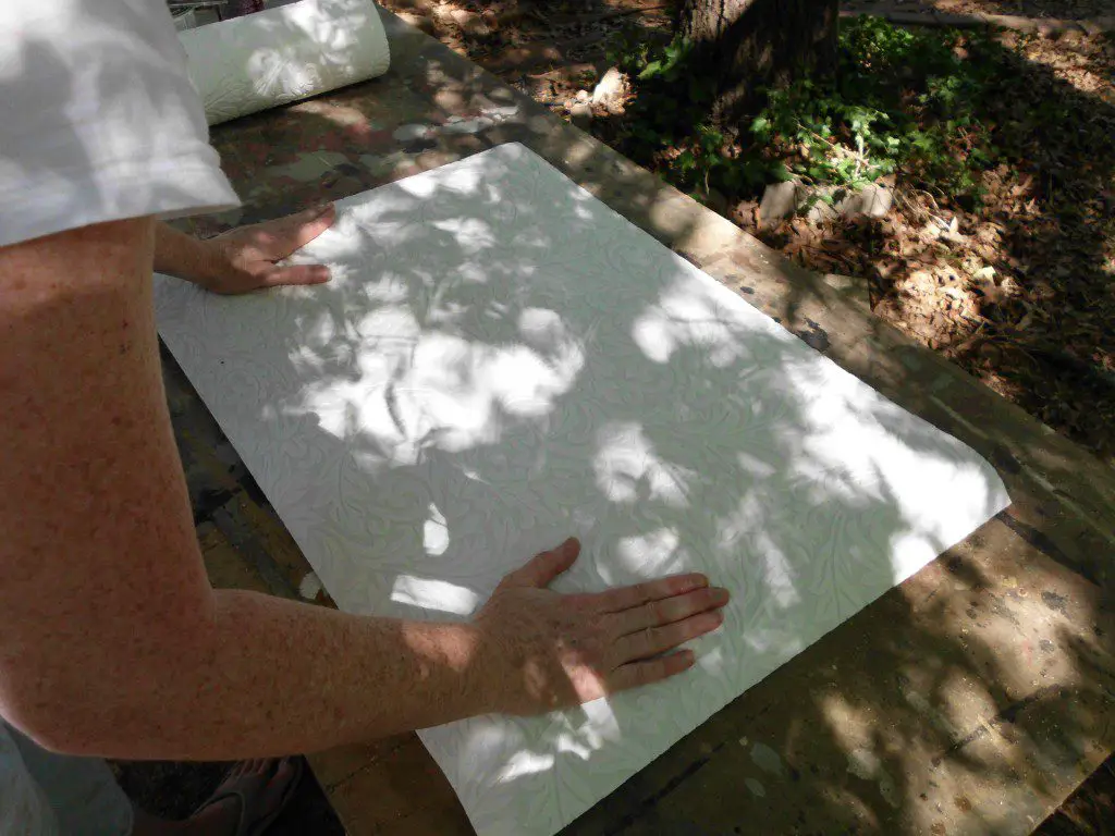 how to make DIY art with wallpaper smooth out bubbles