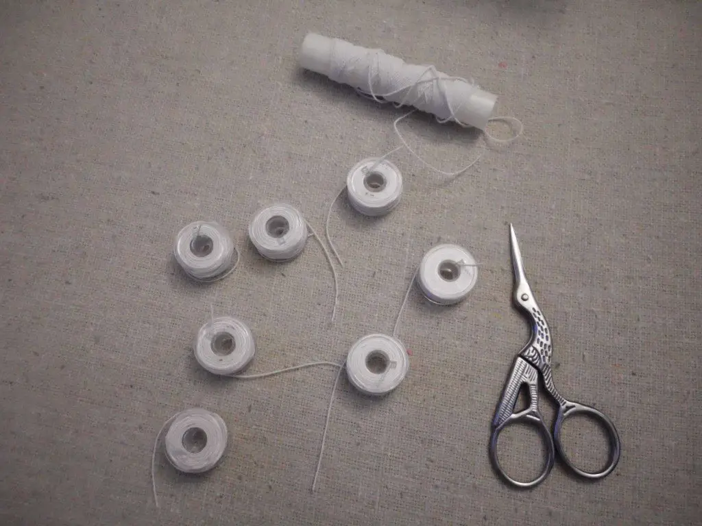 How to Use Elastic Thread to Make Smocked Fabric elastic thread wound on bobbins