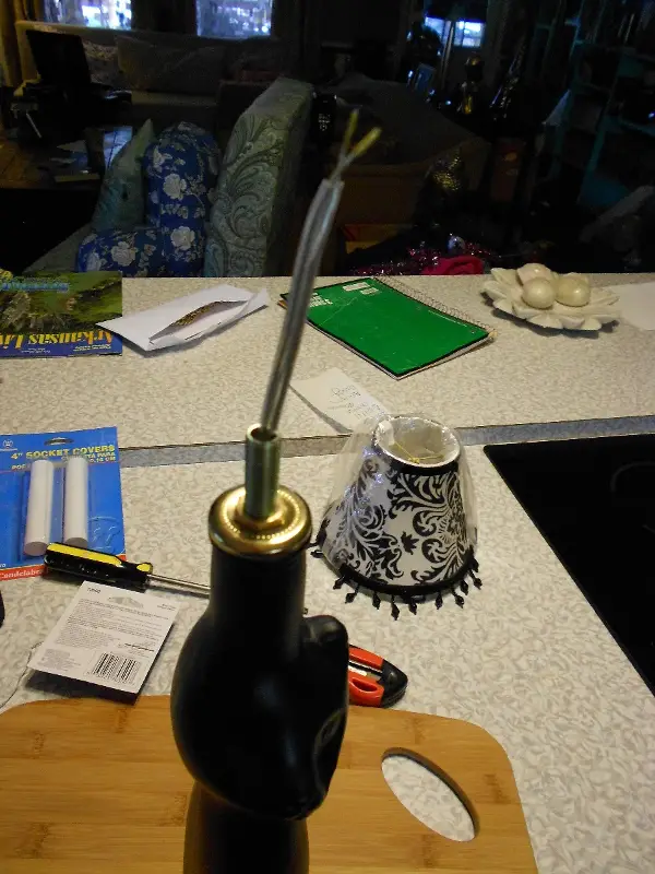 make a lamp from a wine bottle end of wire