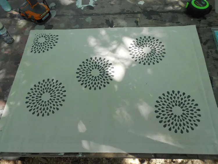 How to Make a Canvas Floor Cloth random stenciled flowers
