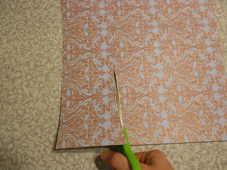 Recycle a Container and Make It Pretty cut paper on lines drawn