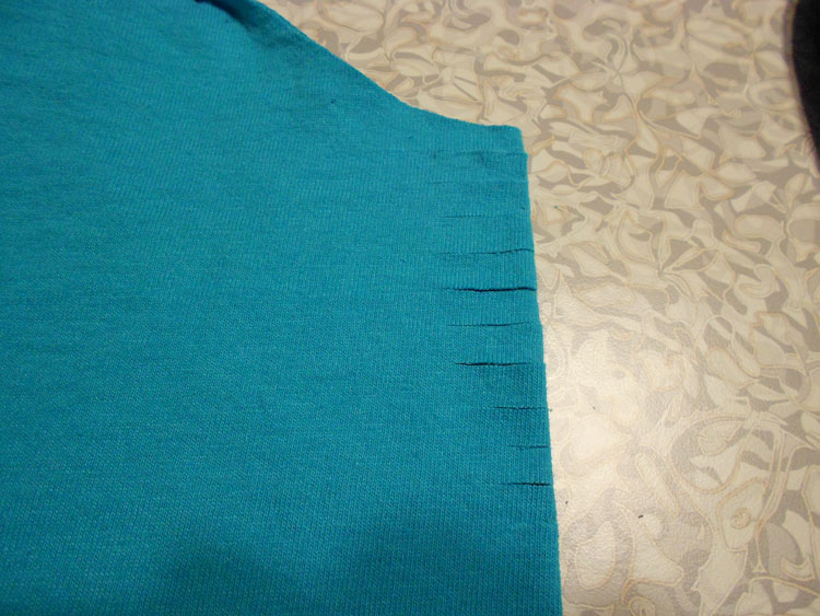 How to Alter a Man's T-shirt Again small cuts at center front below neckline