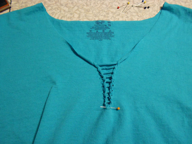 How to Alter a Man's T-shirt Again braided cuts with pin to hold the last part