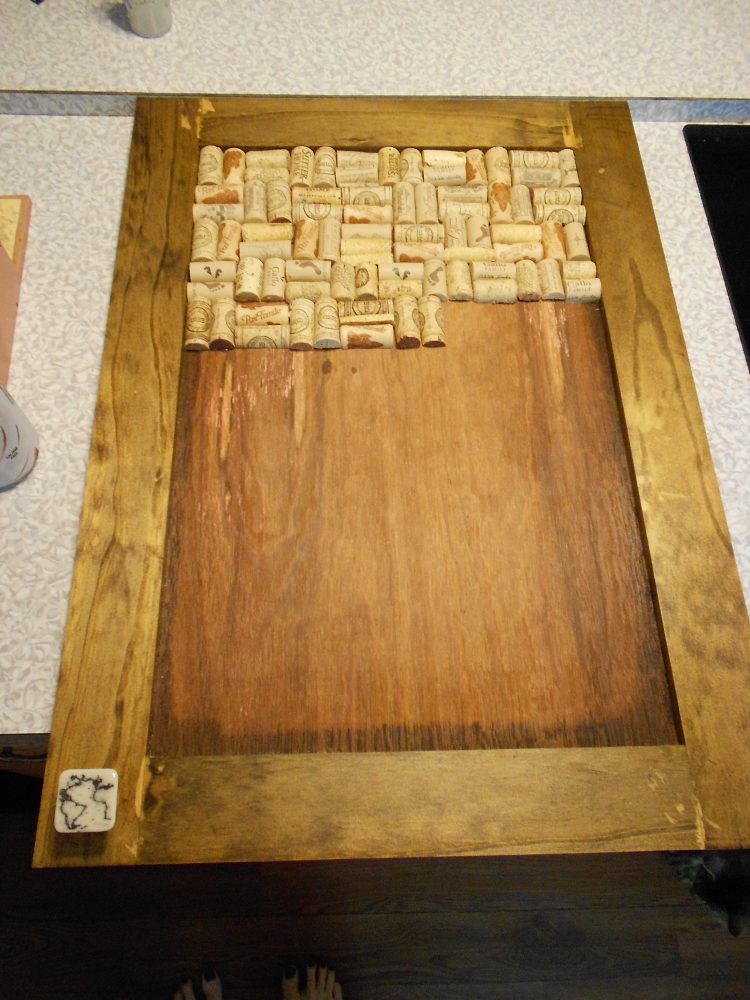 framed cork board wine bottle corks gluing on backing frame