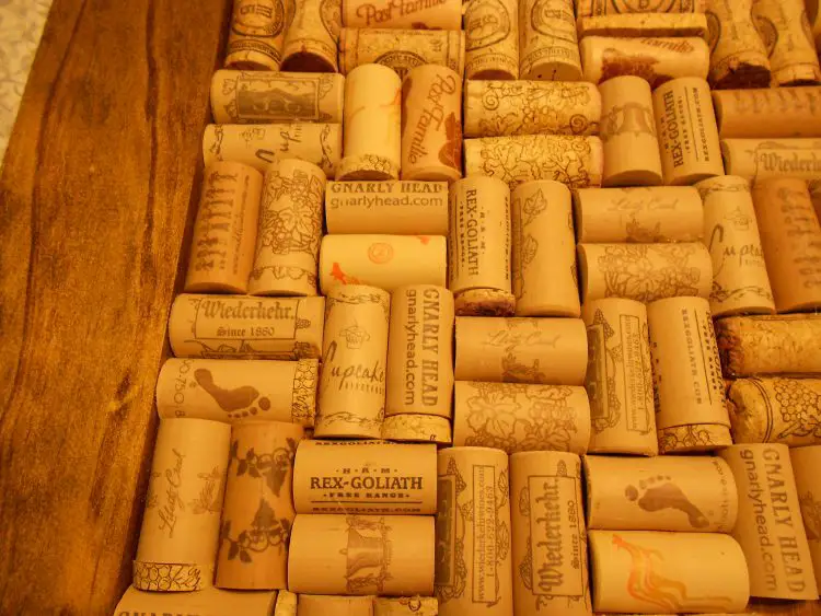 framed cork board wine bottle corks close up