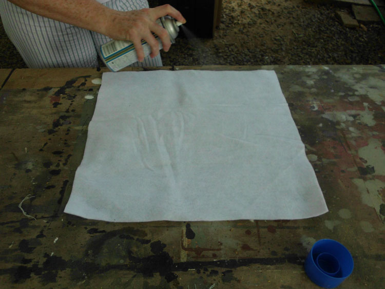 Make a Canvas Cube spray fleece with fabric adhesive