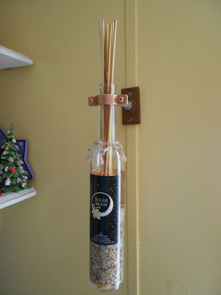 How to Make a Fragrance Diffuser with a Wine Bottle insert bottle neck into split ring