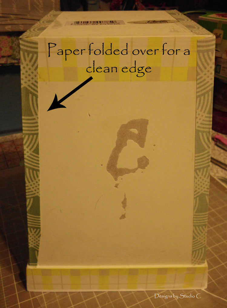 How to Give an Old Wastebasket a Makeover fold paper edges over sides