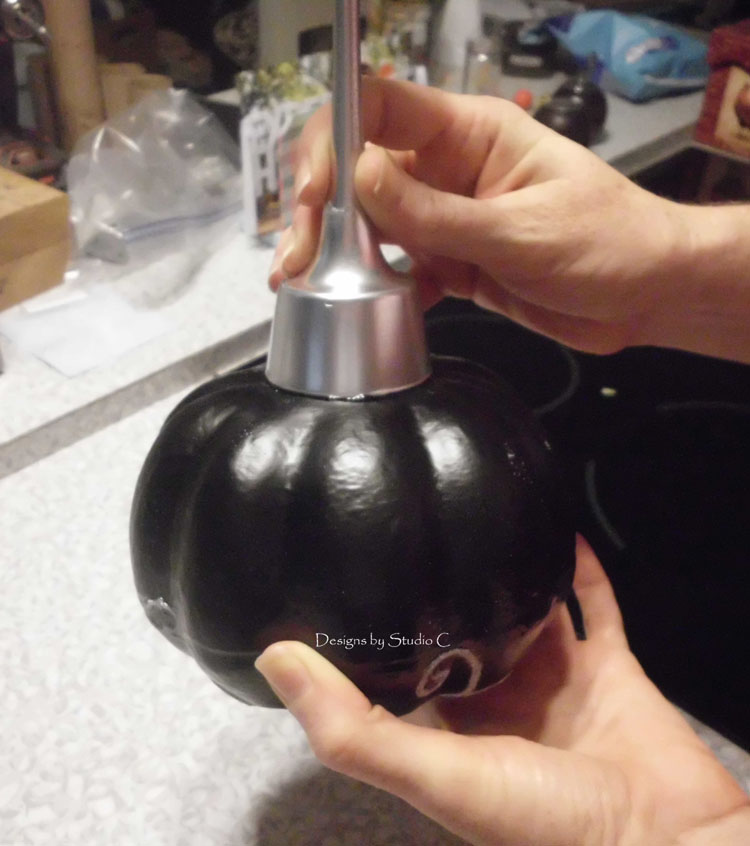 dollar store halloween pumpkin glue candle holder to pumpkin