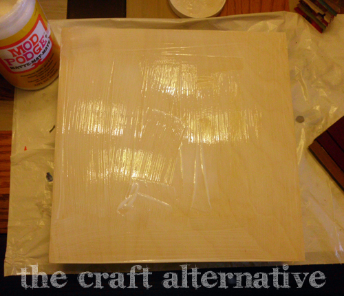 How to Make a Wood Sign with a Paper Background apply mod podge