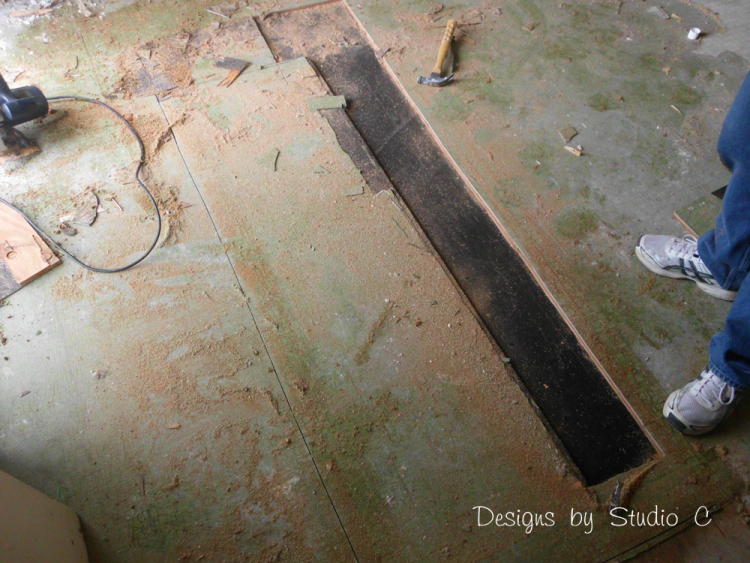 how to remove a subfloor SANY2064