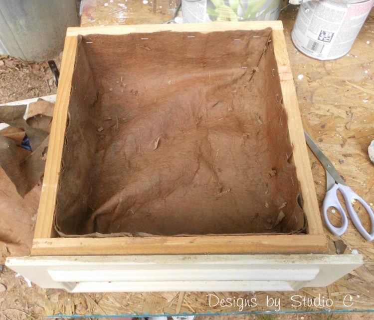 use old drawer boxes for planters weed cloth