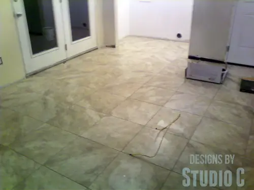installing vinyl tile with grout flooring installed