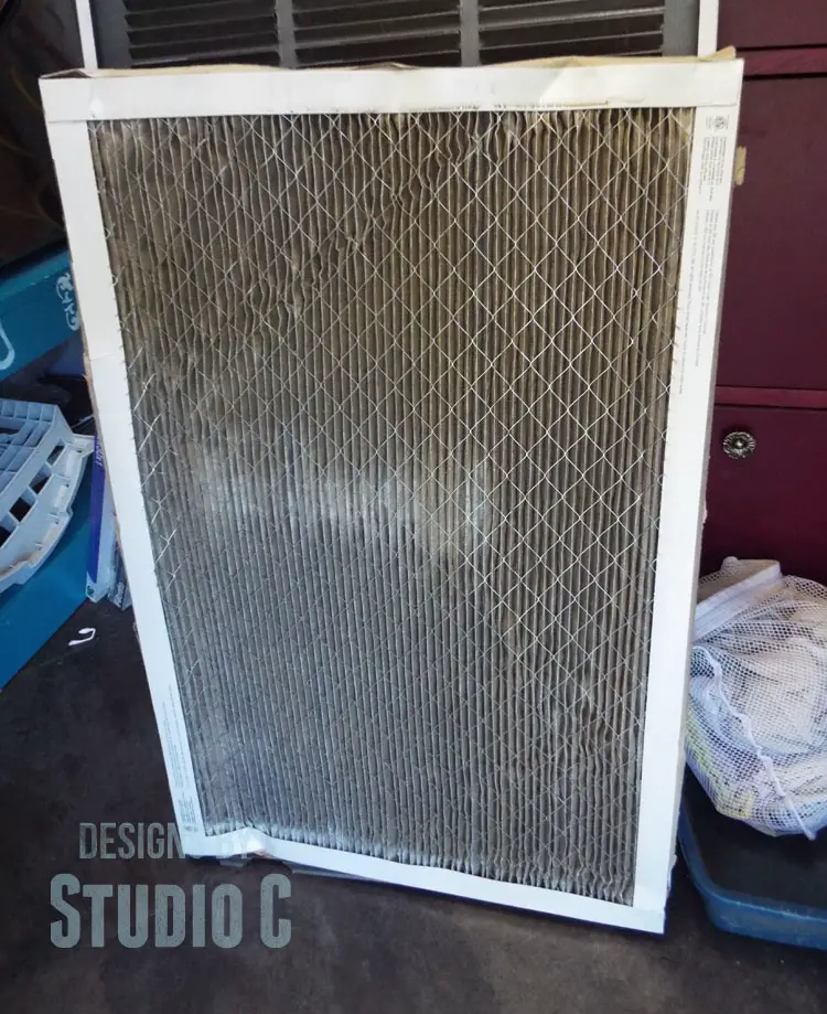Changing a Furnace Filter with 3M Filtrete outside