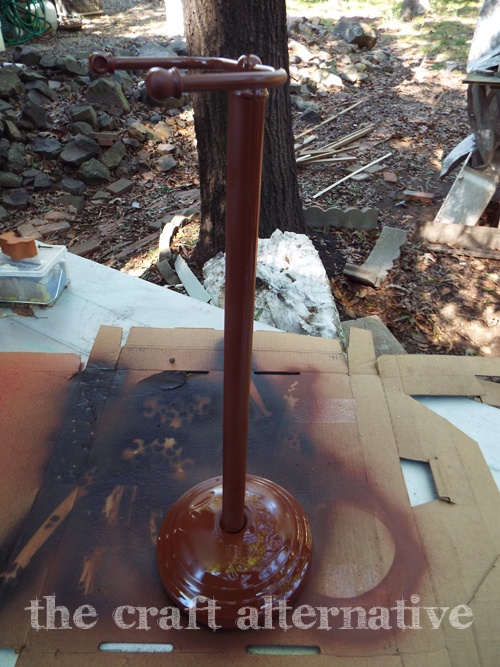 Make a Yarn Holder with a Toilet Paper Stand using spray primer