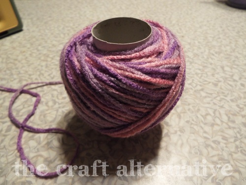 Make a Yarn Holder with a Toilet Paper Stand yarn ball