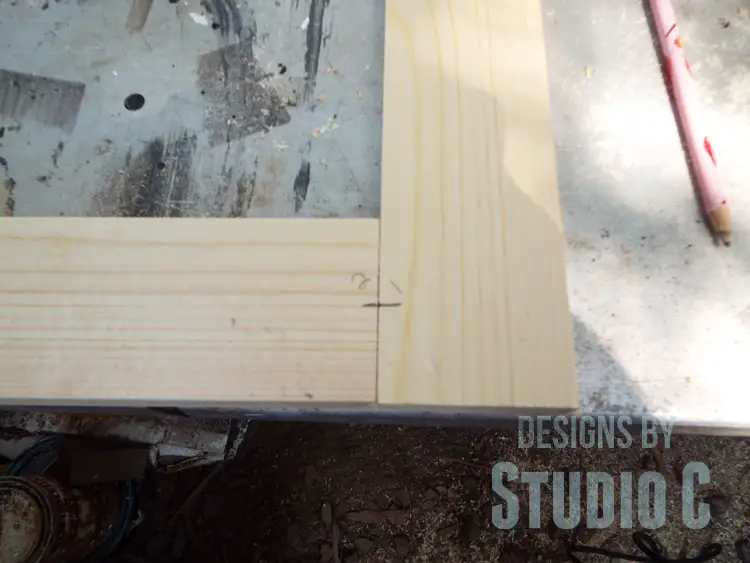 How to Use a Biscuit Joiner to Make a Door Frame - marking center of boards