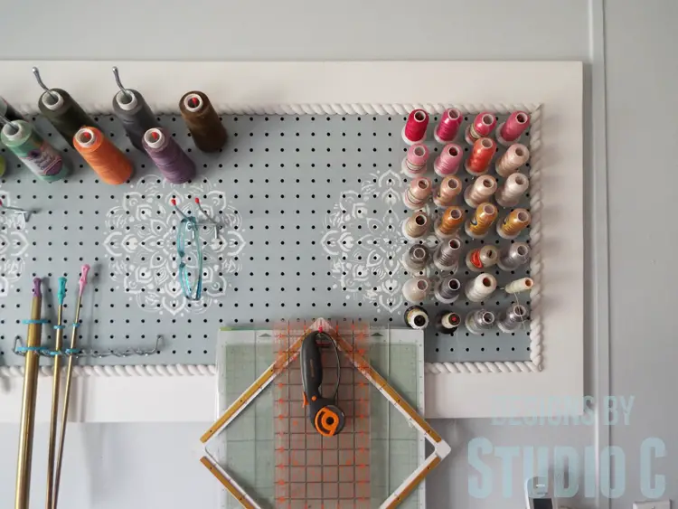 DIY Furniture Plans to Build a Framed Peg Board - Close up of thread