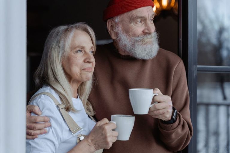 home modifications for the aging population couple with coffee mugs