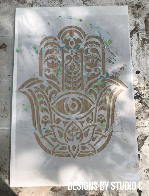 easy to build art piece with a stenciled panel hamsa stencil