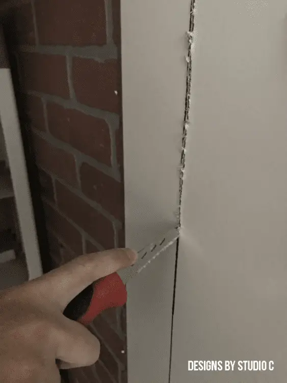 cutting opening installing window removing drywall