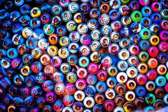 how to spray paint screws assorted cans photo by davide baraldi