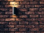 home lighting plan light on a brick wall