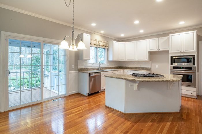 lights over kitchen sink clean bright kitchen area