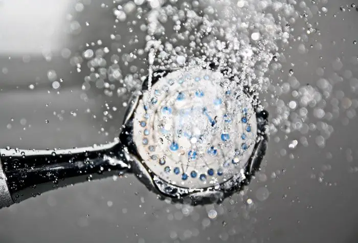 reasons to insulate water heater hand held shower head
