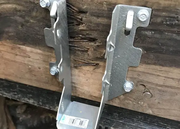 diy joist hanger tool installed on ledge board