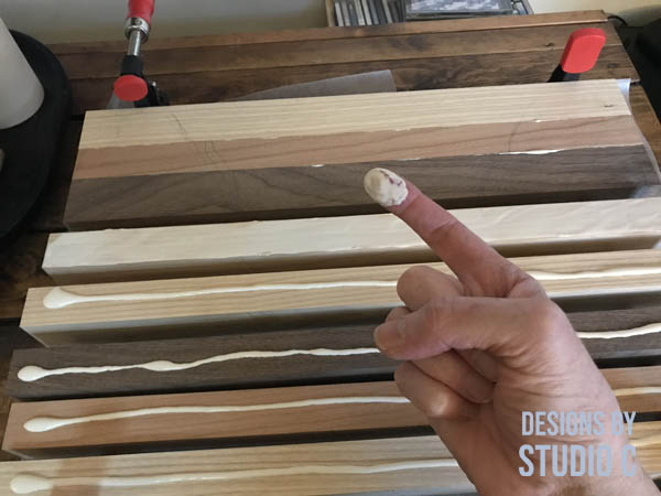 diy cutting board kit spreading glue