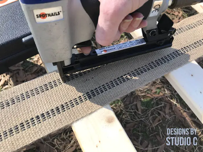 DIY connected bed slats stapling webbing to board