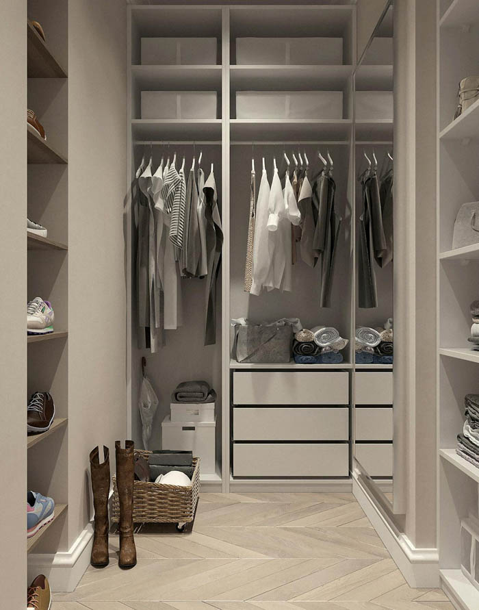 how to organize your closet featured image of neat and organized clothing