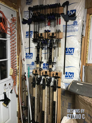 DIY clamp organizer hanging on wall for storing clamps and keeping them neat