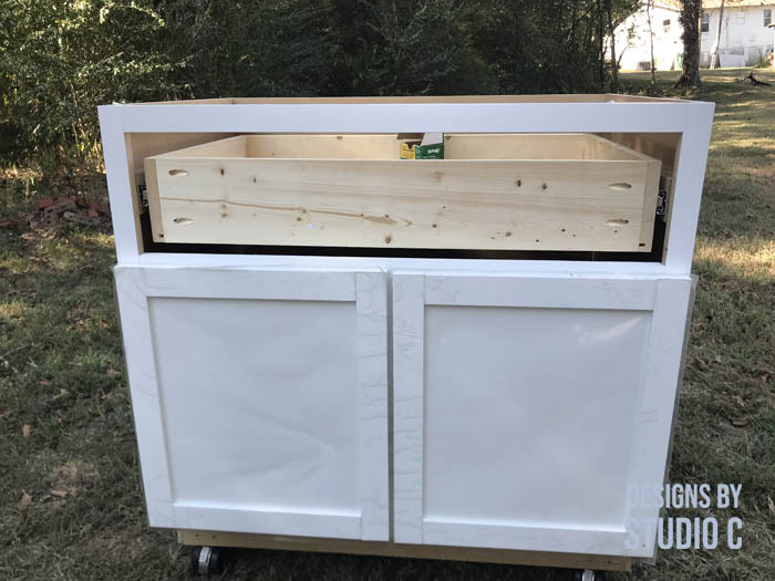 how to make a work table out of a base cabinet installed drawer box