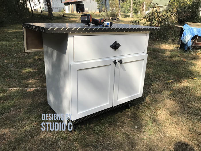 how to make a work table out of a base cabinet completed project photo
