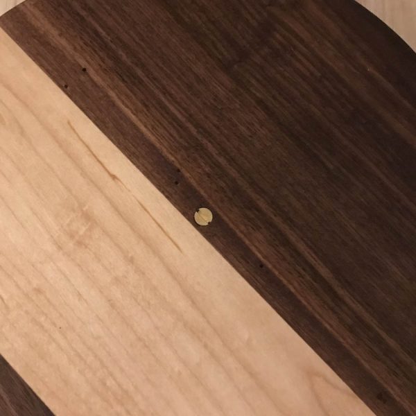 round hardwood serving boards walnut maple screw closeup