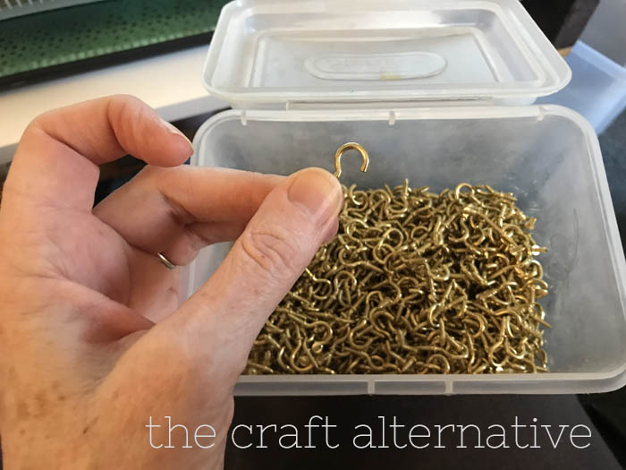 how to make a cast on comb for a knitting machine cup hooks