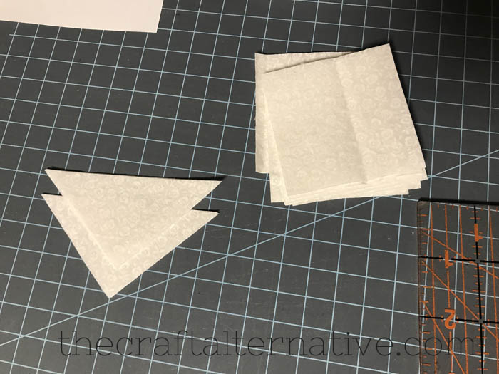 how to make a woven star quilt block cutting the smaller triangles
